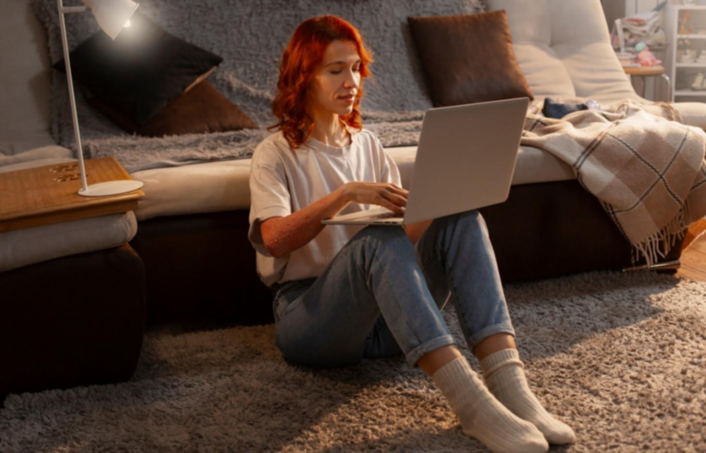 Student working on financial analysis with calculator and documents